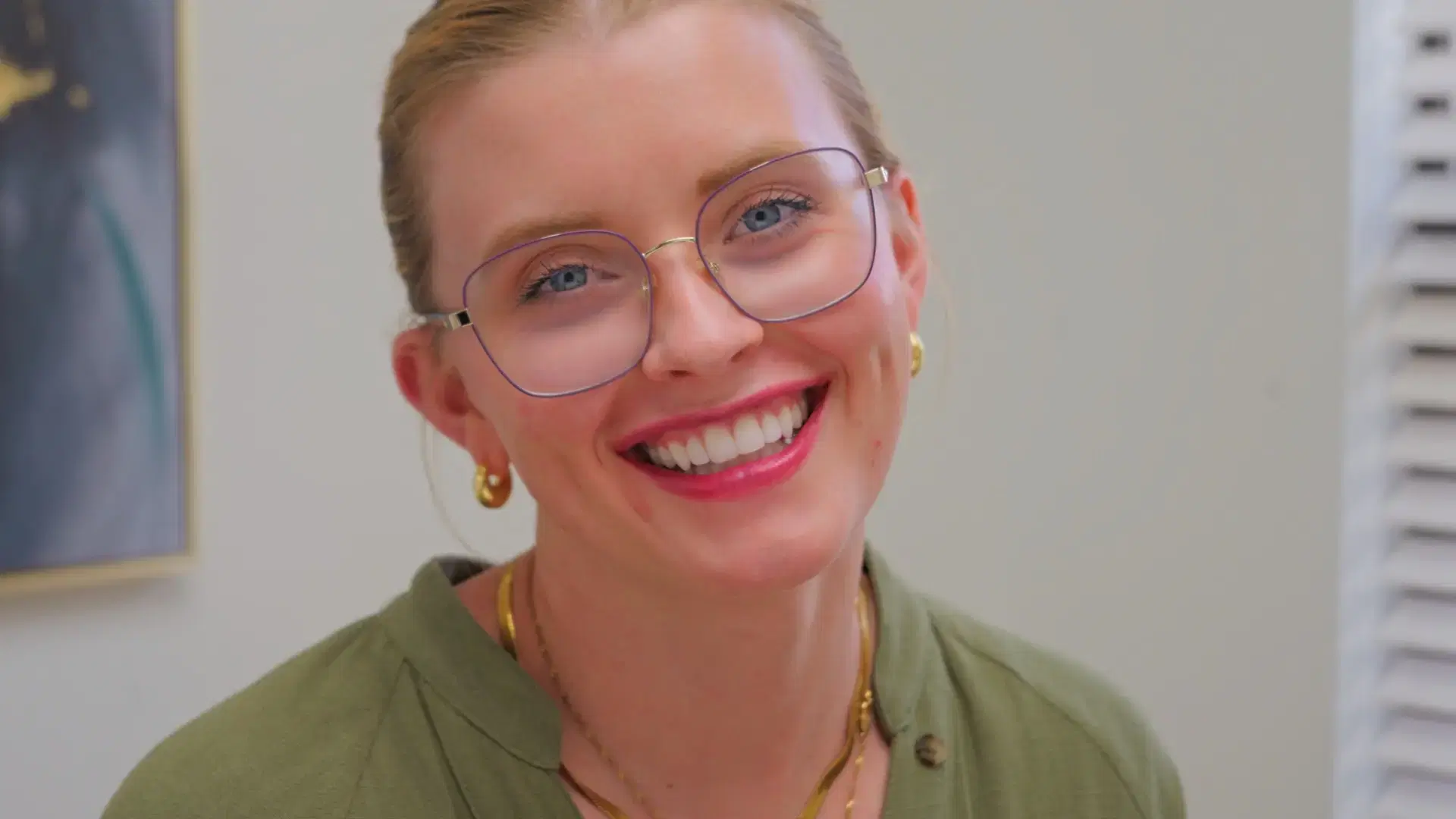Smiling patient at Hope Dental Implant Center, confident in her care and treatment plan